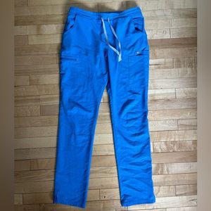 Yola Skinny Figs scrub pants.